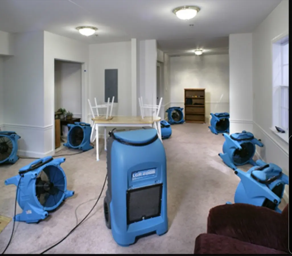 Air movers and dehumidifier setup for Water Extraction & Removal in Kingston